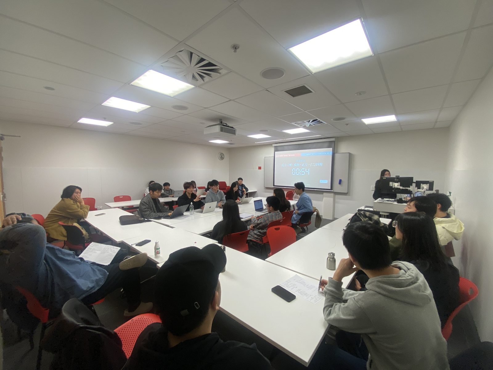 Practice debate in a seminar room